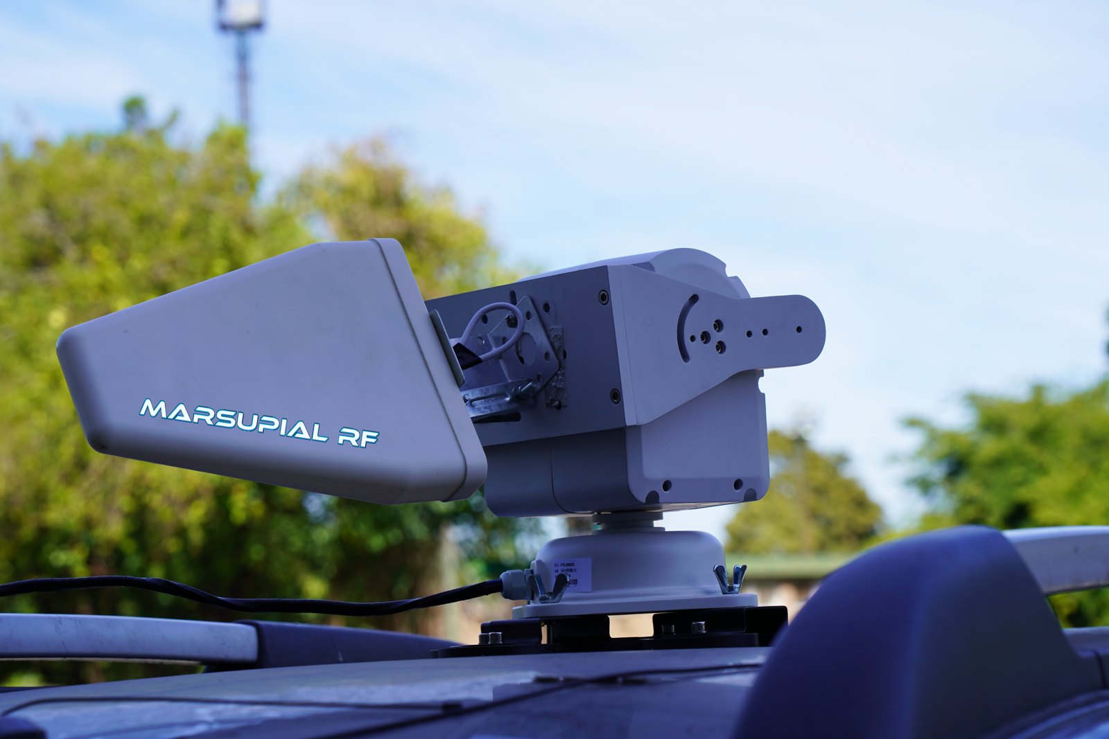 Close-up of a Marsupial RF directional RF payload mounted on a vehicle.